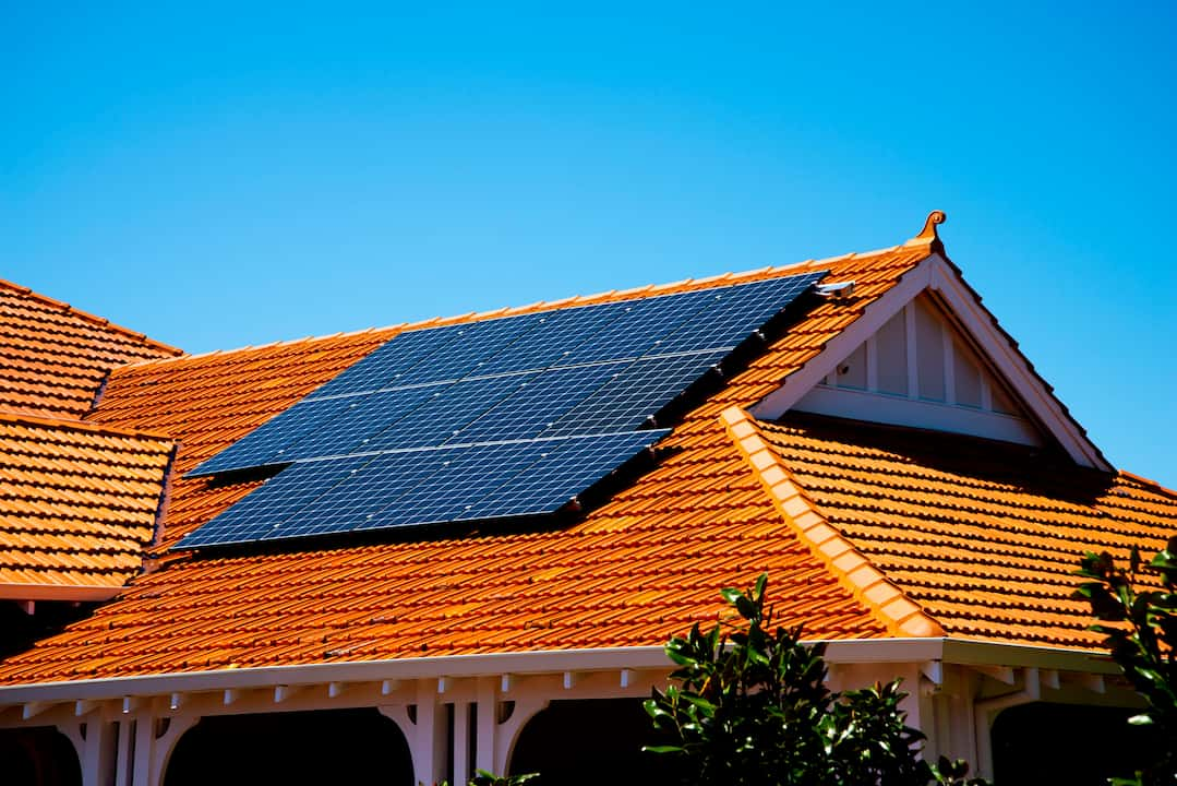 House with solar panels showing benefits of solar energy in perth